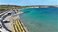 foto plaz pri hoteli Seabank Resort&Spa v stredisku Mellieha Bay na ostrove Malta